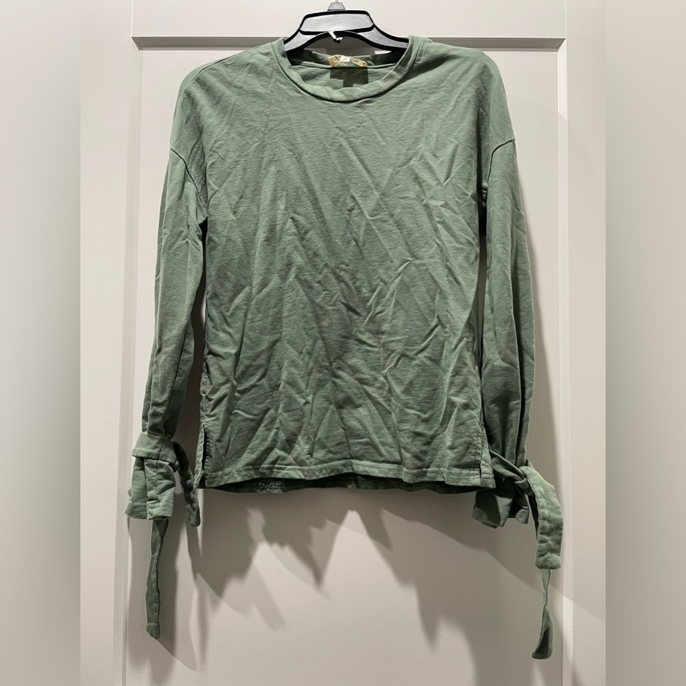 Green long sleeve with decorative arm ties